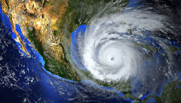 hurricane approaching the American continent visible above the Earth, a view from the satellite. Elements of this image furnished by NASA.