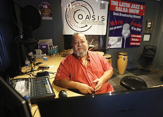 Luis “Sweet Lou” Hidalgo, founder of the 17th Annual Latin Jazz and Salsa Festival, at his Oasis Broadcasting Network studio. This year’s festival, “Rumba en la Market,” will be held at the 17th Street Market in Shockoe Bottom on Saturday, Aug. 31, from noon to 8 p.m.