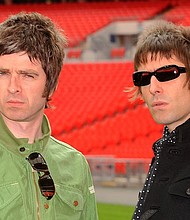 (From left) Noel Gallagher and Liam Gallagher of Oasis at London's Wembley Stadium in 2008.
Mandatory Credit:	Samir Hussein/Getty Images/File via CNN Newsource