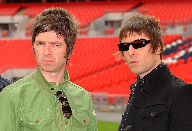 (From left) Noel Gallagher and Liam Gallagher of Oasis at London's Wembley Stadium in 2008.
Mandatory Credit:	Samir Hussein/Getty Images/File via CNN Newsource