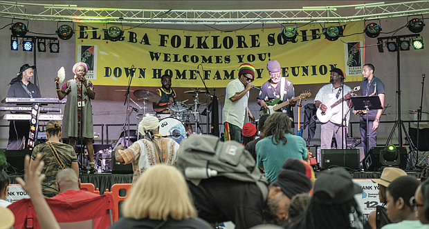 Reggae band Wildfire performs, right, during the 33rd Down Home Family Reunion in Abner Clay Park in Jackson Ward on Aug. 17.