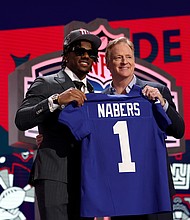 Malik Nabers, pictured with NFL Commissioner Roger Goodell after being selected sixth overall by the New York Giants, will be the first Giants player to wear #1 since 1935.
Mandatory Credit:	Gregory Shamus/Getty Images via CNN Newsource