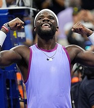 Frances Tiafoe celebrates after beating Alexei Popyrin in the fourth round of the US Open.
Mandatory Credit:	Robert Deutsch/USA TODAY/Reuters via CNN Newsource