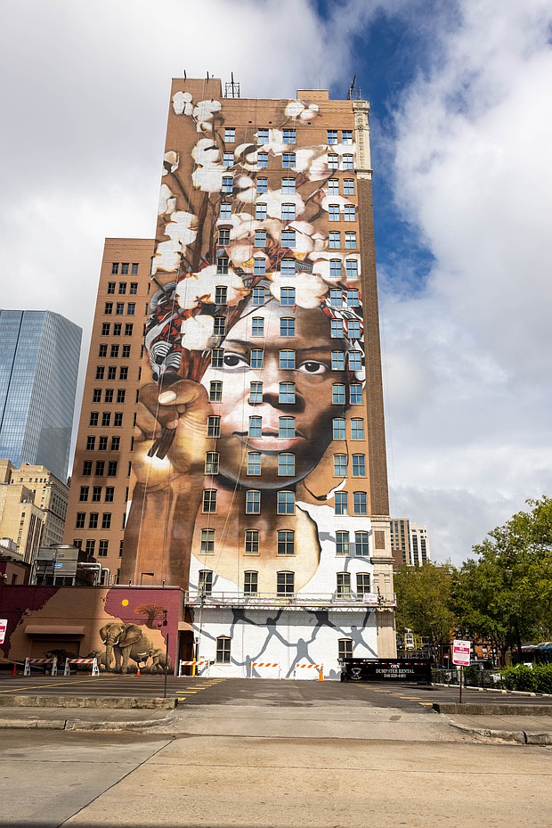The “From Slavery to Freedom,” painted on side of the downtown Cotton Exchange Building at 1310 Prairie St., Abolitionist Harriett Tubman and countless other enslaved people. The mural was among three unveiled by Harris County Commissioner Rodney Ellis, Street Art for Mankind (SAM), Downtown Houston+ and Sigma Gamma Rho Sorority Inc.