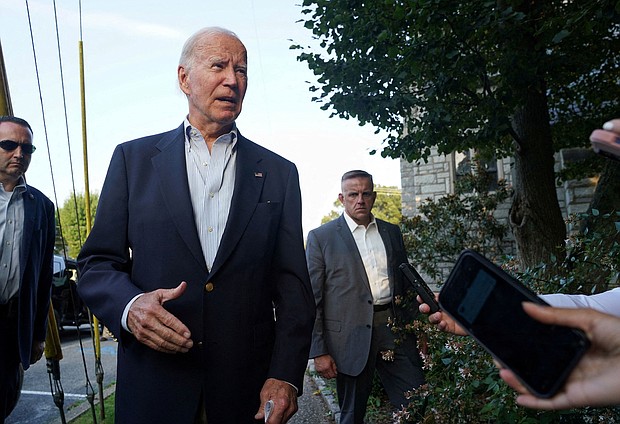 President Joe Biden speaks to reporters after attending church in Rehoboth Beach, Delaware, on August 31.
Mandatory Credit:	Kevin Lamarque/Reuters via CNN Newsource