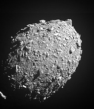 The last complete image of asteroid moonlet Dimorphos was taken by the DRACO imager on NASA's DART mission at a distance of about 7 miles (12 kilometers) and 2 seconds before impact.
Mandatory Credit:	NASA/Johns Hopkins APL via CNN Newsource