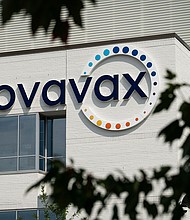 Signage at a Novavax facility in Gaithersburg, Maryland, US, on Aug. 26, 2024. Novavax shares earlier this month dropped 14% in premarket trading after the vaccine-maker reported revenue for the second quarter that missed the average analyst estimate and updated its guidance for the year.
Mandatory Credit:	Graeme Sloan/Bloomberg/Getty Images via CNN Newsource