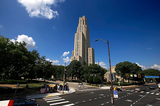 University of Pittsburgh police arrested a person suspected of attacking a group of Jewish students with a bottle on August 30, and the Cathedral of Learning is pictured towering over the University of Pittsburgh campus on July 8, 2019.
Mandatory Credit:	Gene J. Puskar/AP/File via CNN Newsource