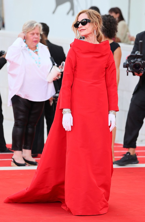 Isabelle Huppert's Balenciaga couture opera coat was inspired by theater goers of the 1950s.
Mandatory Credit:	JB Lacroix/FilmMagic/Getty Images via CNN Newsource