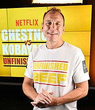 Joey Chestnut breaks own world record by eating 83 hot dogs and buns in Netflix contest on September 2.
Mandatory Credit:	David Becker/Getty Images via CNN Newsource