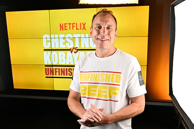 Joey Chestnut breaks own world record by eating 83 hot dogs and buns in Netflix contest on September 2.
Mandatory Credit:	David Becker/Getty Images via CNN Newsource