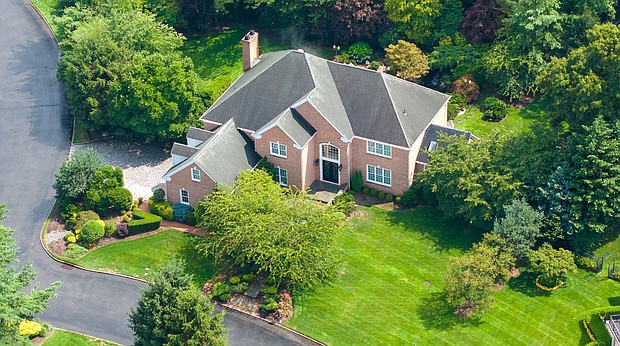 An aerial view of the Saxony Court, home in Manhasset, New York, belonging to Chris Hu and Linda Sun, July 24, 2024. Sun is the former deputy chief of staff for New York Gov. Kathy Hochul.
Mandatory Credit:	J. Conrad Williams Jr./Newsday RM/Getty Images via CNN Newsource