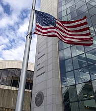 An American flag flies outside the headquarters building of the U.S. Securities and Exchange Commission (SEC) in 2018.
Mandatory Credit:	Zach Gibson/Bloomberg/Getty Images via CNN Newsource