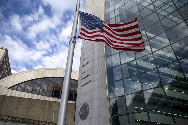 An American flag flies outside the headquarters building of the U.S. Securities and Exchange Commission (SEC) in 2018.
Mandatory Credit:	Zach Gibson/Bloomberg/Getty Images via CNN Newsource