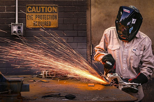 A student works during a welding class at Tennessee College of Applied Technology Nashville. From 2019 to 2024, hiring rates rose for roles requiring a vocational or associate’s degree.
Mandatory Credit:	John Amis/AP via CNN Newsource