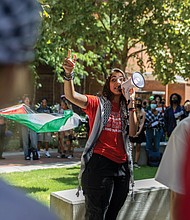 Sereen Haddad, a Virginia Commonwealth University junior, speaks during a student-organized walkout Wednesday, Sept. 4, advocating for continued support of Palestine and addressing VCU’s April 29 deployment of police in riot gear at a pro-Palestinian protest. The walkout culminated in a gathering at VCU’s Park Plaza.