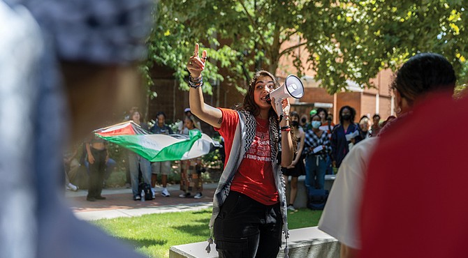 Sereen Haddad, a Virginia Commonwealth University junior, speaks during a student-organized walkout Wednesday, Sept. 4, advocating for continued support of Palestine and addressing VCU’s April 29 deployment of police in riot gear at a pro-Palestinian protest. The walkout culminated in a gathering at VCU’s Park Plaza.