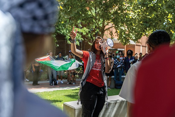 More than 100 Virginia Commonwealth University students walked out of their classrooms and assembled in the Park Plaza Amphitheater behind …