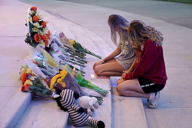 People attend a vigil at Jug Tavern Park following a shooting at Apalachee High School in Winder, Georgia, U.S. September 4.
Mandatory Credit:	Elijah Nouvelage/Reuters via CNN Newsource