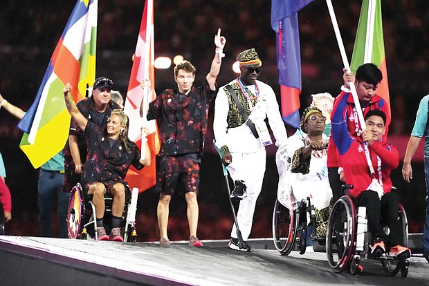 Athletes from different delegations parade Sept. 8 during the closing ceremony of the 2024 Paralympics in Paris.