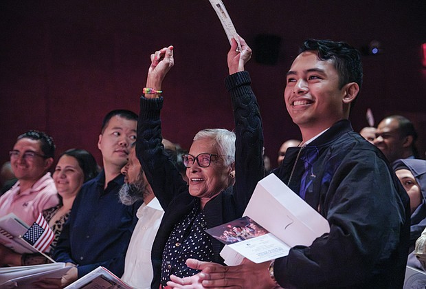 Ninety-four candidates from 48 countries are sworn in by Judge Roger L. Gregory as newly naturalized citizens during a ceremony held on July 4 at the Virginia Museum of History and Culture.