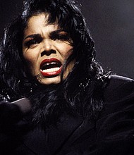 Janet Jackson, pictured performing on stage during her Rhythm Nation World tour in Rotterdam, Netherlands on October 1990, reveals she had another wardrobe malfunction.
Mandatory Credit:	Michel Linssen/Redferns/Getty Images/File via CNN Newsource