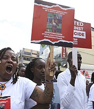 A march is held in the Kenyan city of Eldoret after the Olympic marathon runner Rebecca Cheptegei died aged 33, succumbing to burns caused by her boyfriend, Dickson Ndiema, during an attack at her home in Kenya.



following Cheptegei's death.
Mandatory Credit:	Andrew Kasuku/AP via CNN Newsource