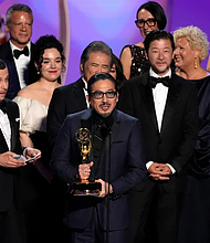 Justin Marks, center, and Hiroyuki Sanada, center right, and the team from "Shogun" accepts the award for outstanding drama series CREDIT - Chris Pizzello/Invision/AP