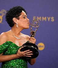 Liza Colon-Zayas poses in the press room with the award for outstanding supporting actress in a drama series for "The Bear."
Mandatory Credit:	Jae C. Hong/Invision/AP via CNN Newsource