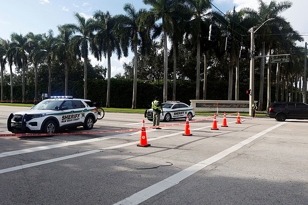 Law enforcement vehicles are parked after reports of shots fired outside Republican presidential nominee and former U.S. President Donald Trump's Trump International Golf Course in West Palm Beach, Florida, U.S. September 15, 2024.
Mandatory Credit:	Marco Bello/Reuters via CNN Newsource