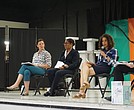 Kenya Gibson speaks at the North Side forum held at Linwood Holton Elementary School, while moderator Grady Hart, right, president of the Rosedale Civic Association, listens. The event drew over 100 residents as Gibson, incumbent Ann-Frances Lambert, and challenger Maria Carra Rose discussed key issues.