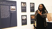 Elvatrice Belsches, guest curator and public historian, gestures toward an exhibit during a preview of “A Prescription
for Change: Black Voices Shaping Healthcare in Virginia” at the Black History Museum & Cultural Center of Virginia.
The exhibition, highlighting Virginia’s Black medical professionals, runs through March 15, 2025.