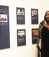 Elvatrice Belsches, guest curator and public historian, gestures toward an exhibit during a preview of “A Prescription
for Change: Black Voices Shaping Healthcare in Virginia” at the Black History Museum & Cultural Center of Virginia.
The exhibition, highlighting Virginia’s Black medical professionals, runs through March 15, 2025.