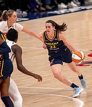 Caitlin Clark drives to the basket in the final regular season game of her rookie year.
Mandatory Credit:	Charles Brock/Icon Sportswire/AP via CNN Newsource