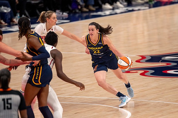Caitlin Clark drives to the basket in the final regular season game of her rookie year.
Mandatory Credit:	Charles Brock/Icon Sportswire/AP via CNN Newsource
