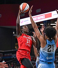 Tina Charles shoots the ball during the game.
Mandatory Credit:	Rich von Biberstein/Icon Sportswire/AP via CNN Newsource