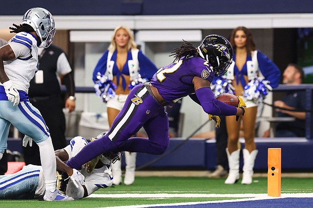 Henry had a breakout game after signing for the Baltimore Ravens in the offseason in the victory against the Dallas Cowboys.
Mandatory Credit:	Ron Jenkins/Getty Images via CNN Newsource
