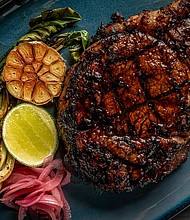 A beautifully seared ribeye that’s as rich in flavor as it is in presentation at Thirteen