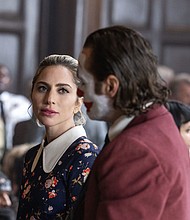 (From left) Lady Gaga and Joaquin Phoenix star in 'Joker: Folie à Deux.'
Mandatory Credit:	Niko Tavernise/DC Comics/Warner Bros. Pictures via