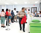 Voters line up at the Richmond Office of Elections on Sept. 20 to cast their ballots for early in-person voting in the 2024 presidential election, along with U.S. Senate, congressional, mayoral, City Council and School Board races. The office is located at 2134 W. Laburnum Ave.