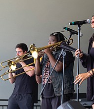 The No BS! Brass Band performs with vocalist Sam Reed at the RVA East End Festival last Saturday.