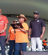 The free annual event raises money for music in the schools. City officials, below, present a plaque to Kernel Patton, also known as RVA’s Line Dance King, for his work in uplifting the community.
