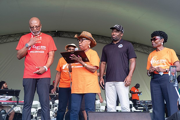 The free annual event raises money for music in the schools. City officials, below, present a plaque to Kernel Patton, also known as RVA’s Line Dance King, for his work in uplifting the community.