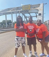 Armstrong students Zion Lundy, Anthony Stokes and Alana Hamilton at the Edmund Pettus Bridge in Selma, Ala.