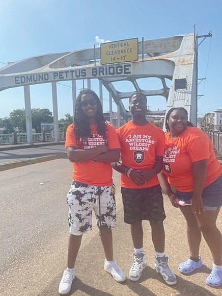 Armstrong students Zion Lundy, Anthony Stokes and Alana Hamilton at the Edmund Pettus Bridge in Selma, Ala.