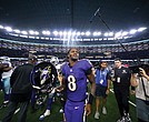 Baltimore Ravens quarterback Lamar Jackson (8) walks off the field Sunday after the team’s win over the
Dallas Cowboys in Arlington, Texas.