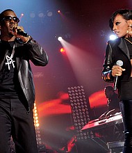 Diddy and Dawn Richard of Diddy-Dirty Money perform during 'MTV Crashes Glasgow - headlined by Diddy-Dirty Money' at The Old Fruit Market on September 29, 2010 in Glasgow, Scotland.
Mandatory Credit:	Gareth Cattermole/Getty Images via CNN Newsource