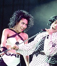 Prince performs with dancer Cat Glover in Frankfurt, Germany on Aug. 27, 1988.