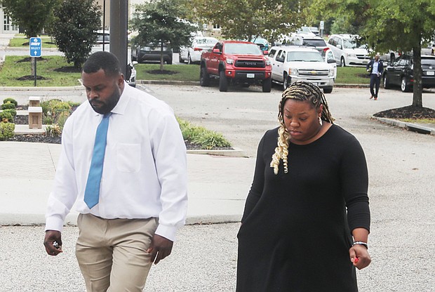 Wavie Jones, a former Central State Hospital employee, returns to Dinwiddie County Courthouse after a break on Monday, Sept. 30. Jones, accompanied by an unidentified woman. Jones was acquitted of involuntary manslaughter charges in the death of 28-year-old Irvo Otieno, on Thursday. Otieno died during a mental health crisis in March 2023 at Central State Hospital.