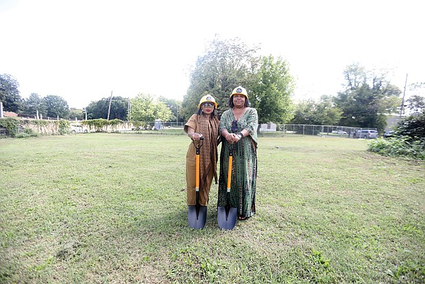 Sesha Joi Moon, co-founder and executive director of The JXN Project, left, and her sister, co-founder Enjoli Moon, hosted the groundbreaking for the Skipwith-Roper Cottage and JXN Haus on Sept. 28 in Jackson Ward.